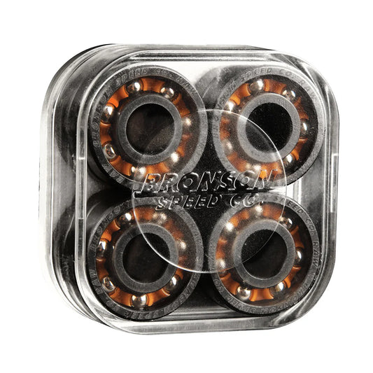 Four skateboard bearings in a clear plastic container with Bronson Speed Co branding.