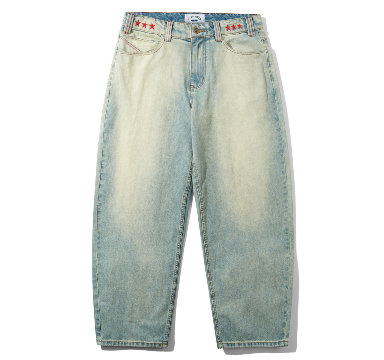 Light blue jeans with red star patches on a white background