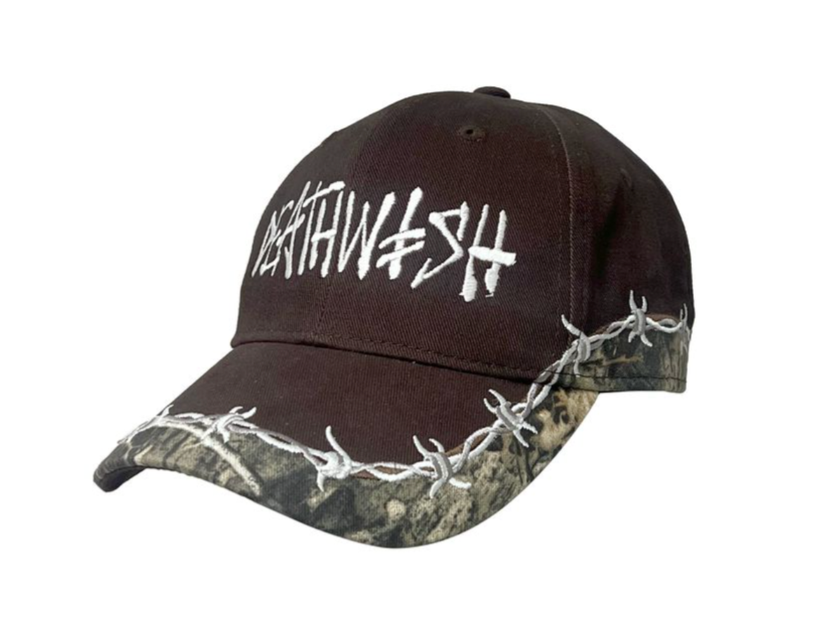 Black cap with white text and barbed wire design on a white background