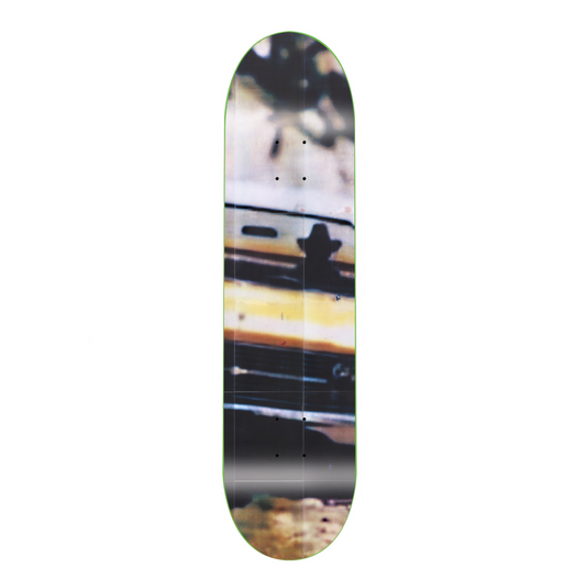 Skateboard deck with a unique design on a white background