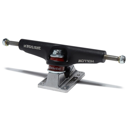 Black skateboard truck with red bearings on a white background