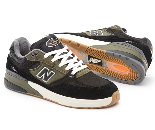 New Balance 933 Reynolds Black Olive chilling on white background