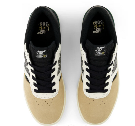 Pair of black and beige sneakers on a white background