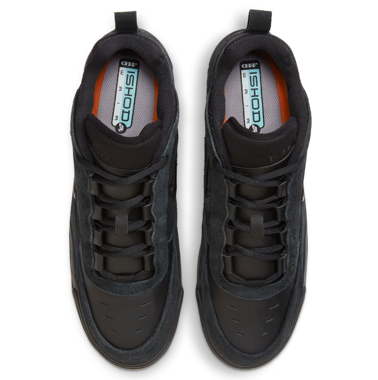 Pair of black sneakers on a white background