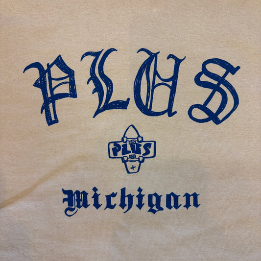 Text 'PLUS Michigan' in blue on a beige background