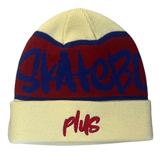 Beanie with 'Skater Plus' text on a wooden floor