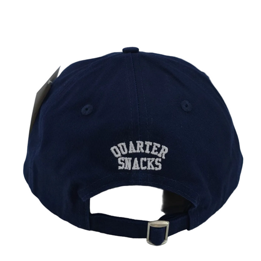Navy blue cap with 'Quarter Snacks' text on a light gray background