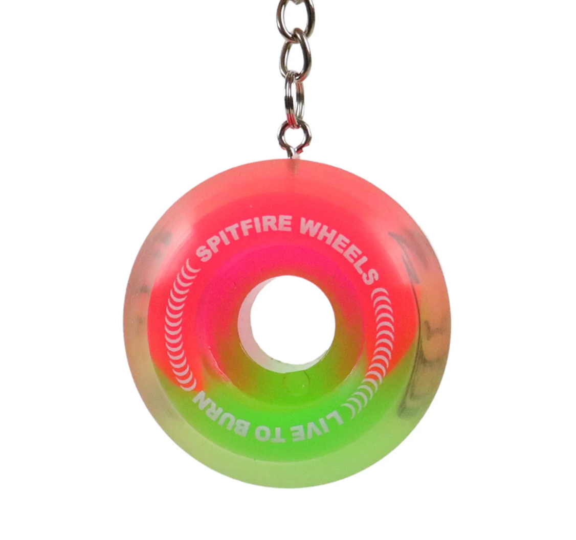 Spitfire Wheels skateboard wheel keychain on a white background