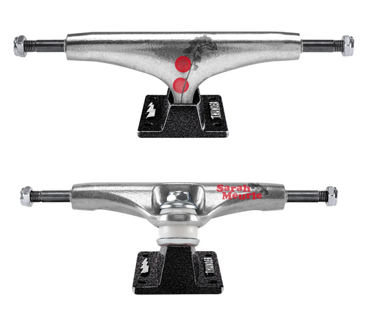 Two skateboard truck assemblies with metal arms and black plastic bases on a white background.