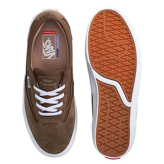 Brown Vans sneakers with white laces on a white background