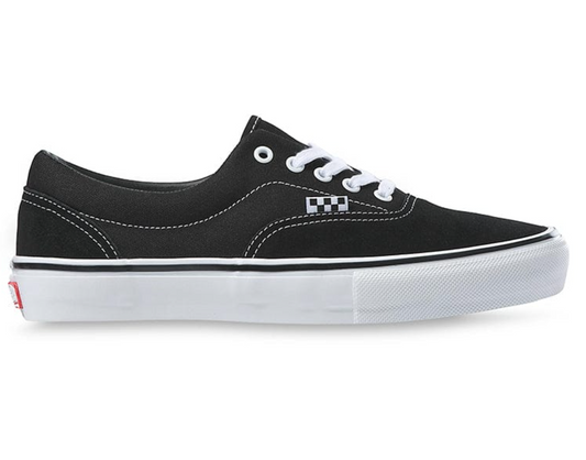 Black sneaker with white sole on a white background