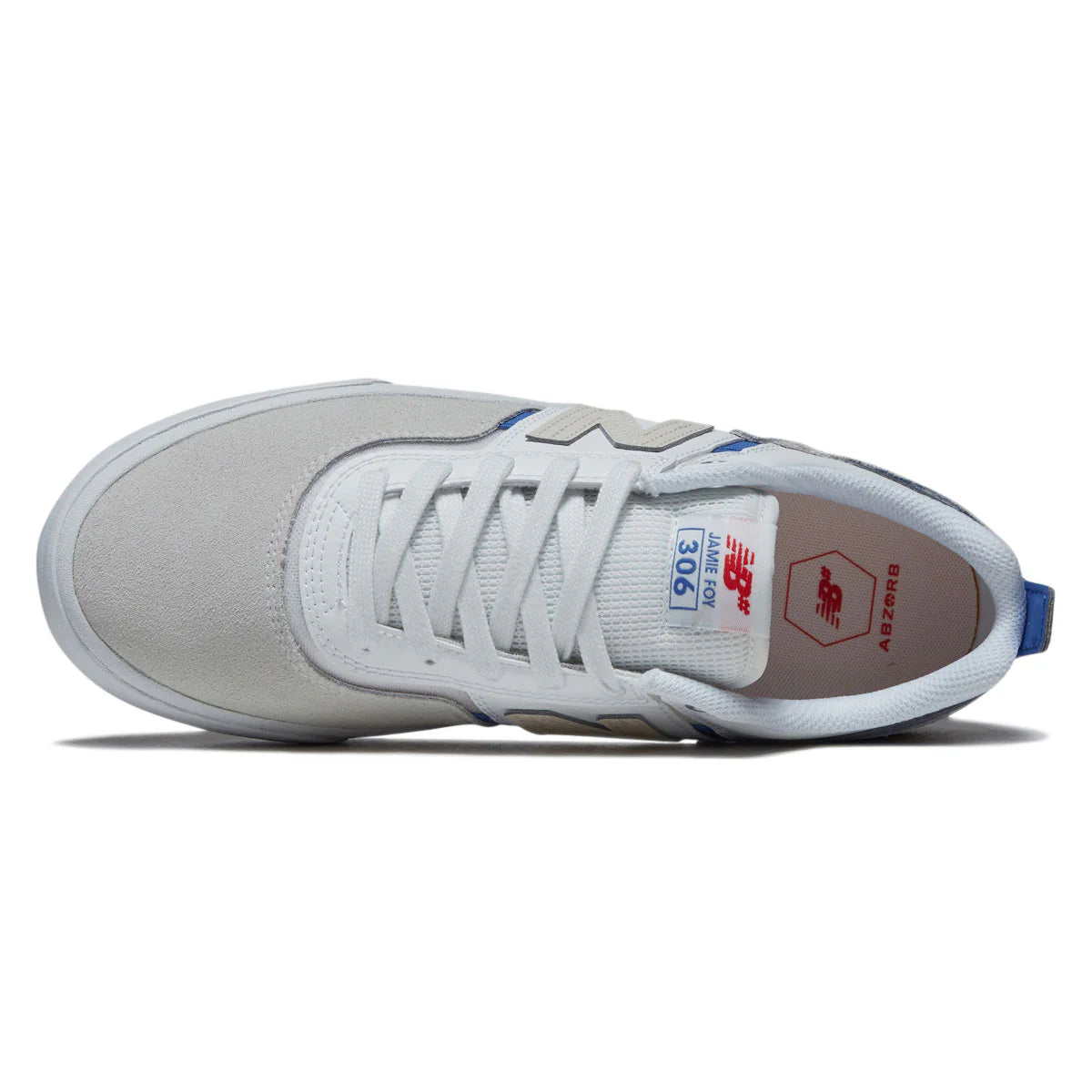 White sneaker with blue accents on a white background