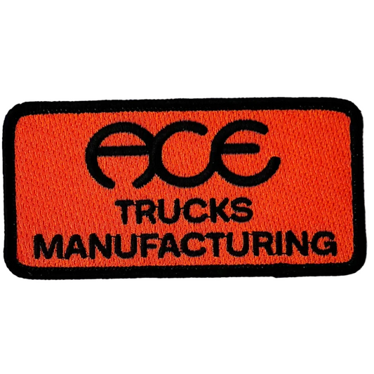 Patch with 'ACE Trucks Manufacturing' text on an orange background