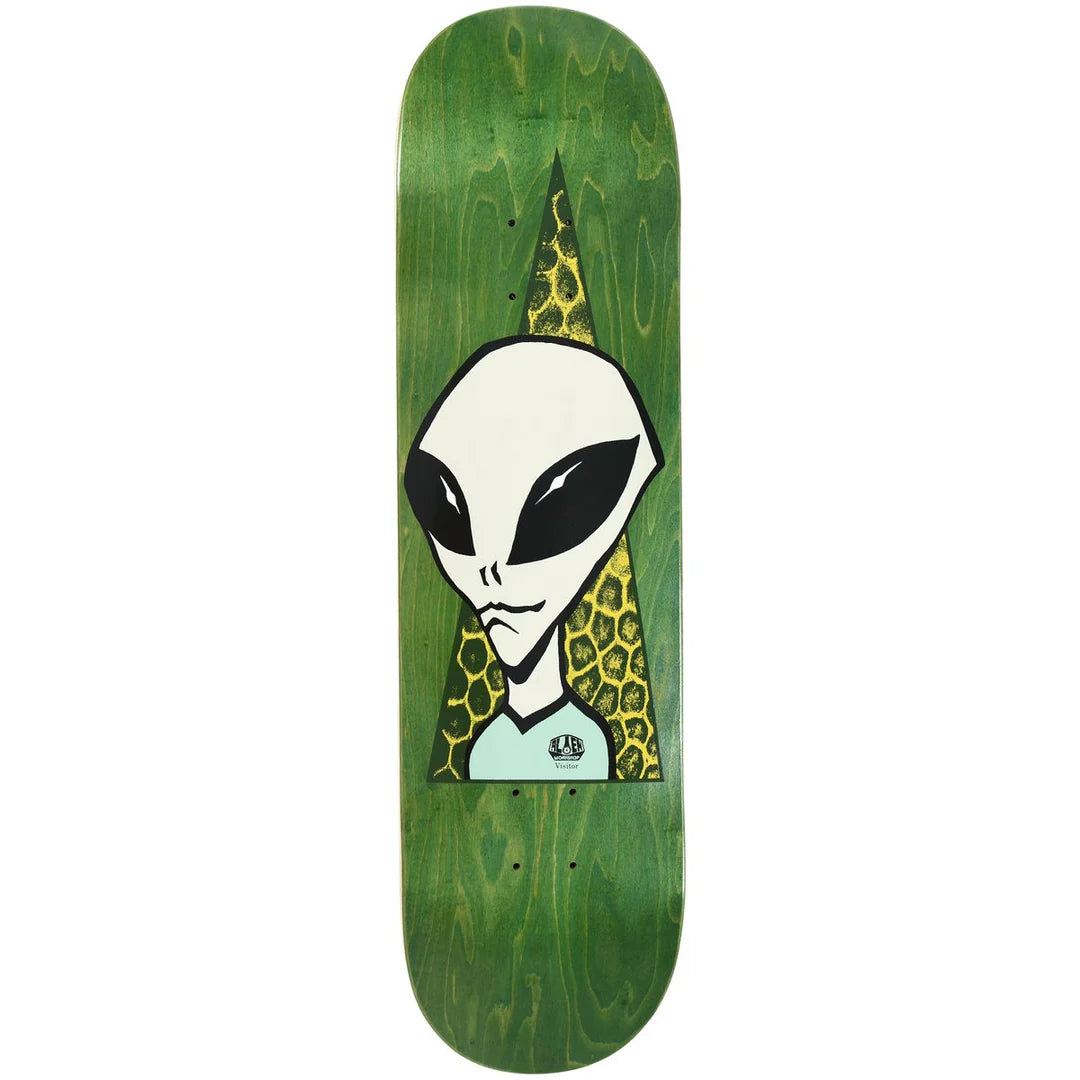 Skateboard deck with alien design on a green background