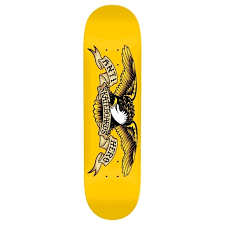 A bright yellow skateboard deck featuring a detailed black and white graphic of a stylized eagle holding a banner with the text 'Anti Hero'