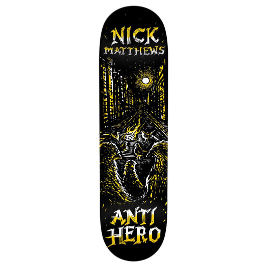 Skateboard deck with 'Nick Matthews' and 'Anti Hero' branding on a black background with yellow and white graphics.