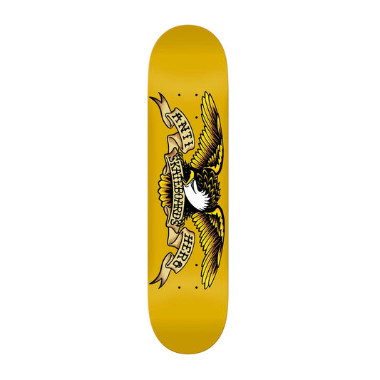 A skateboard deck with a bright yellow background and a central graphic of an eagle holding a banner that reads 'FELINE HABITS'.