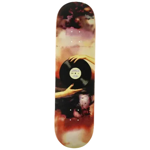 Skateboard deck with hands holding a vinyl record on a colorful background