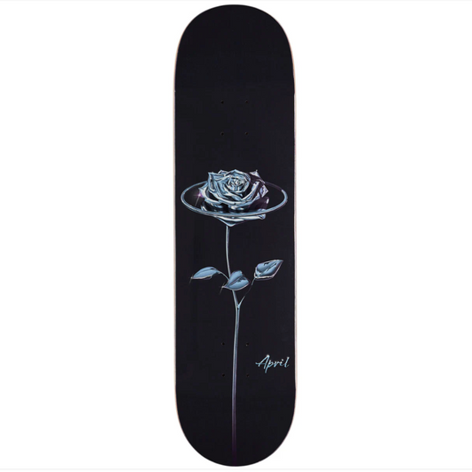 Black skateboard deck with a white rose design on a white background