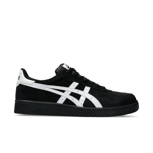A low-top platform sneaker in a dark purple and navy blue colorway, featuring a thick black platform sole, black laces, and contrast stitching.