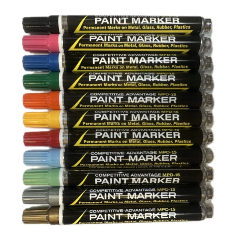 Set of paint markers with various colors on a white background