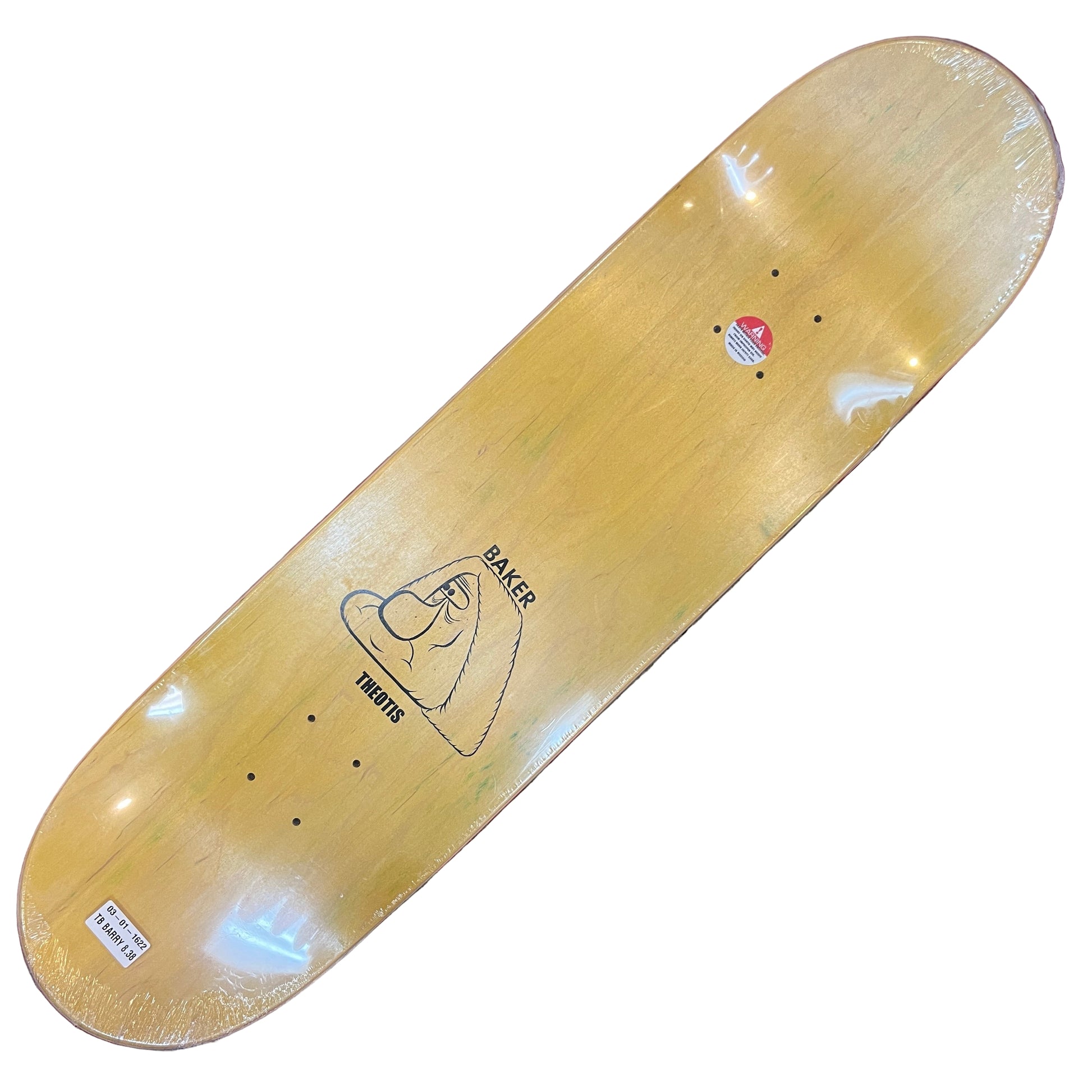 Wooden skateboard deck with a logo on a red and gray patterned surface