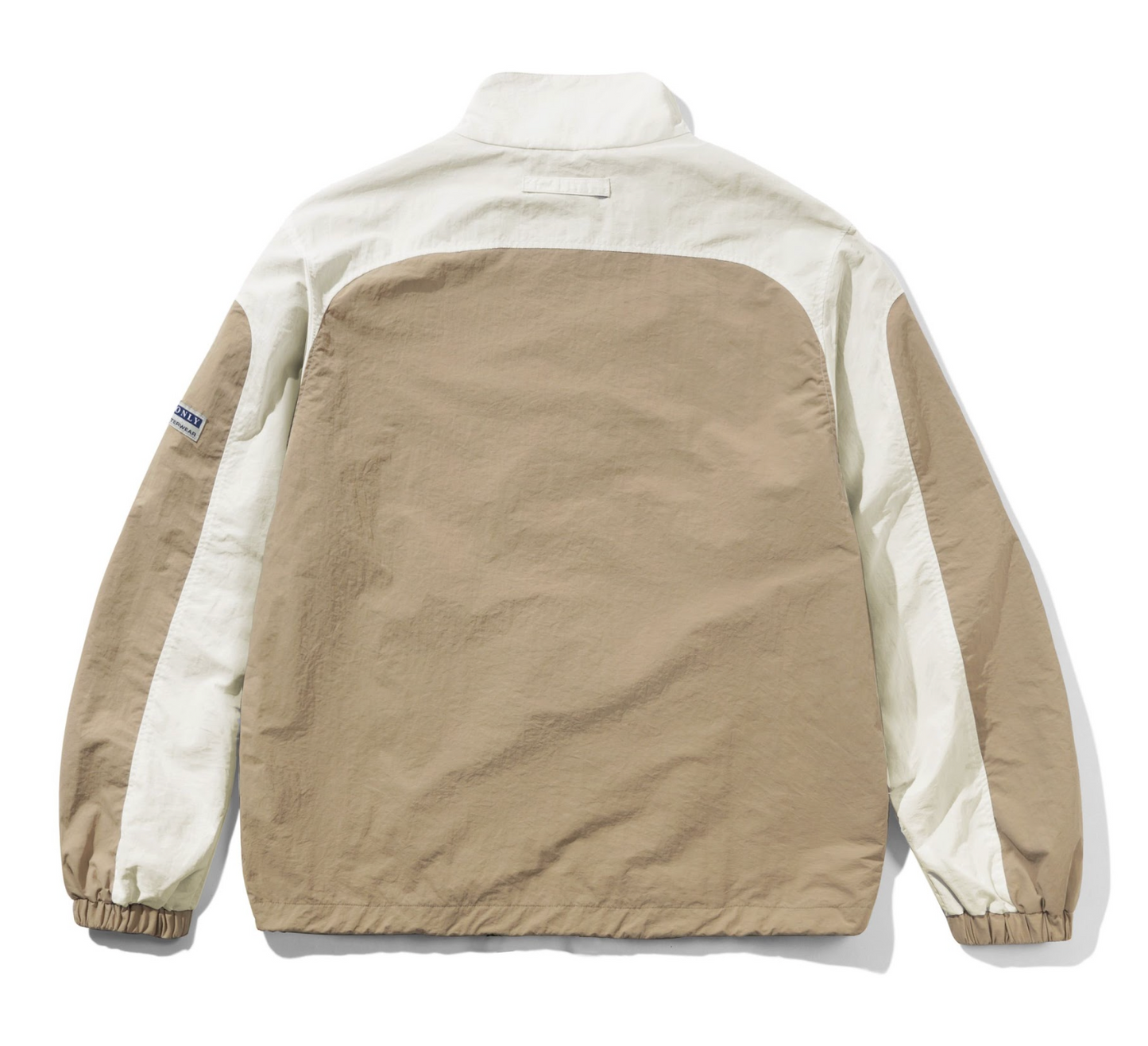 Beige and white jacket on a white background