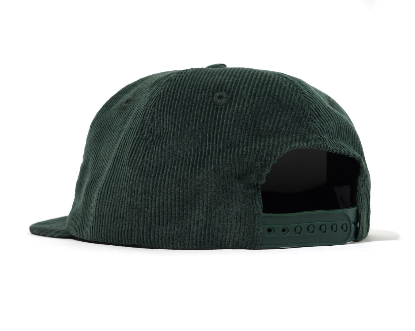 Green corduroy cap on a white background