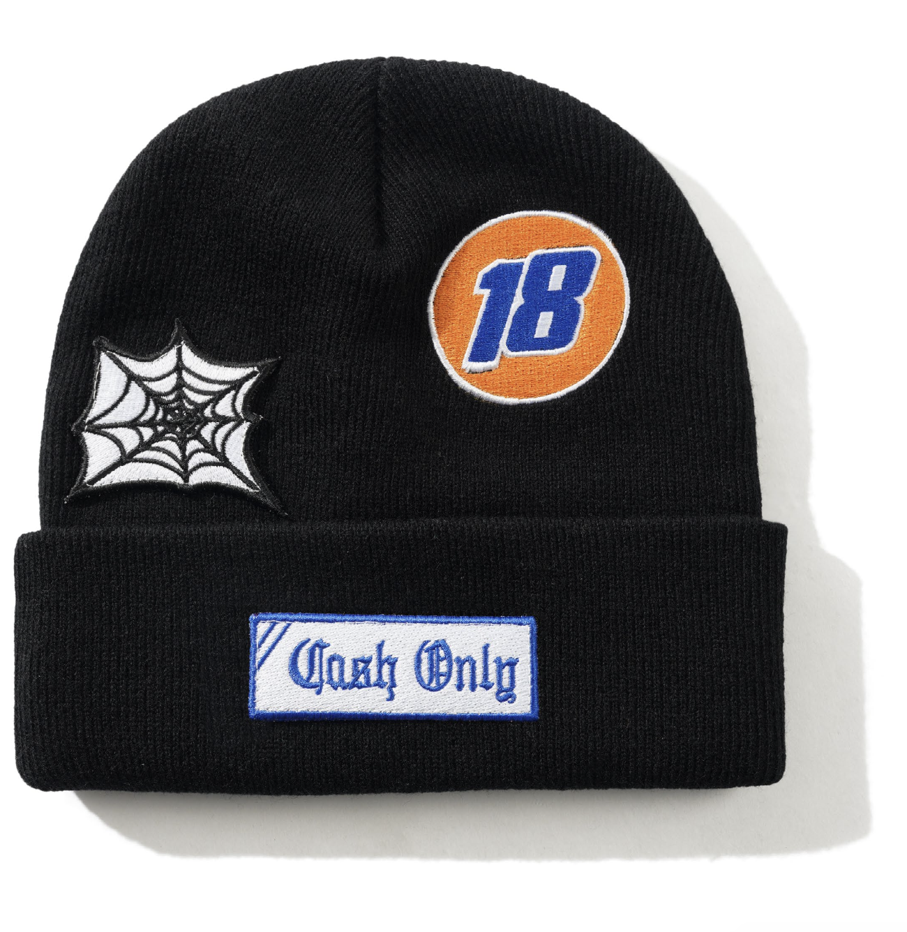 Black beanie with spider web, number 18, and 'Cash Only' patches on a white background