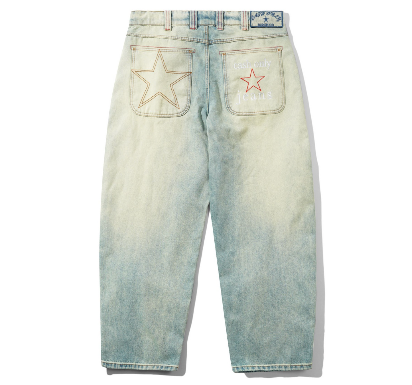 Light blue jeans with star designs on the pockets against a white background