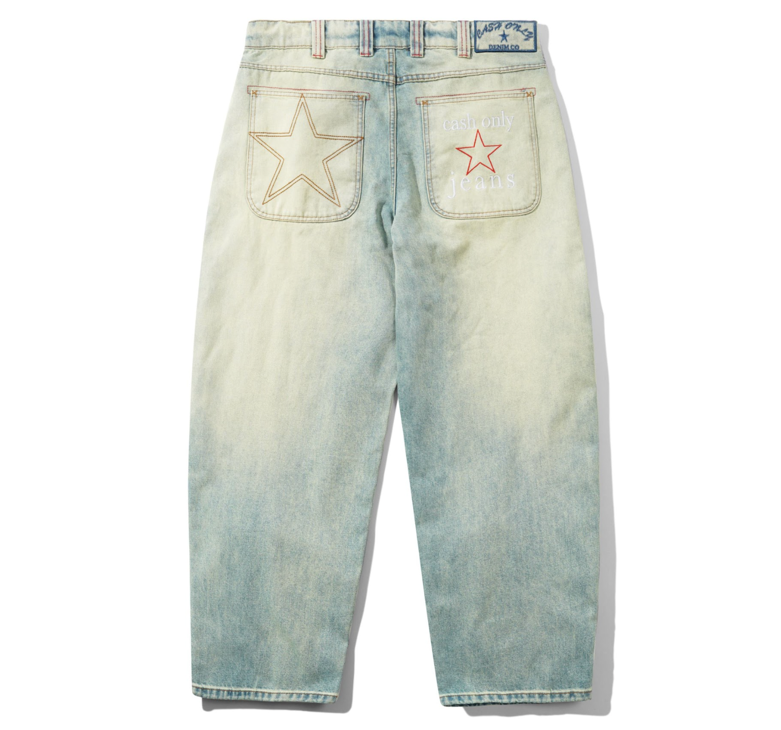 Light blue jeans with star designs on the pockets against a white background