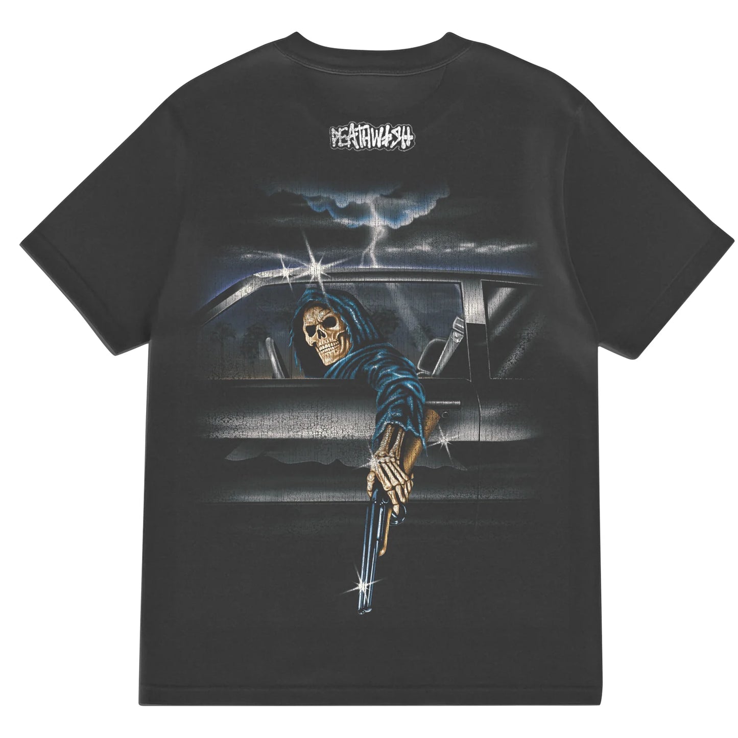 Black t-shirt with a graphic of a skeleton driving a car and holding a gun, with a brand logo on the chest.