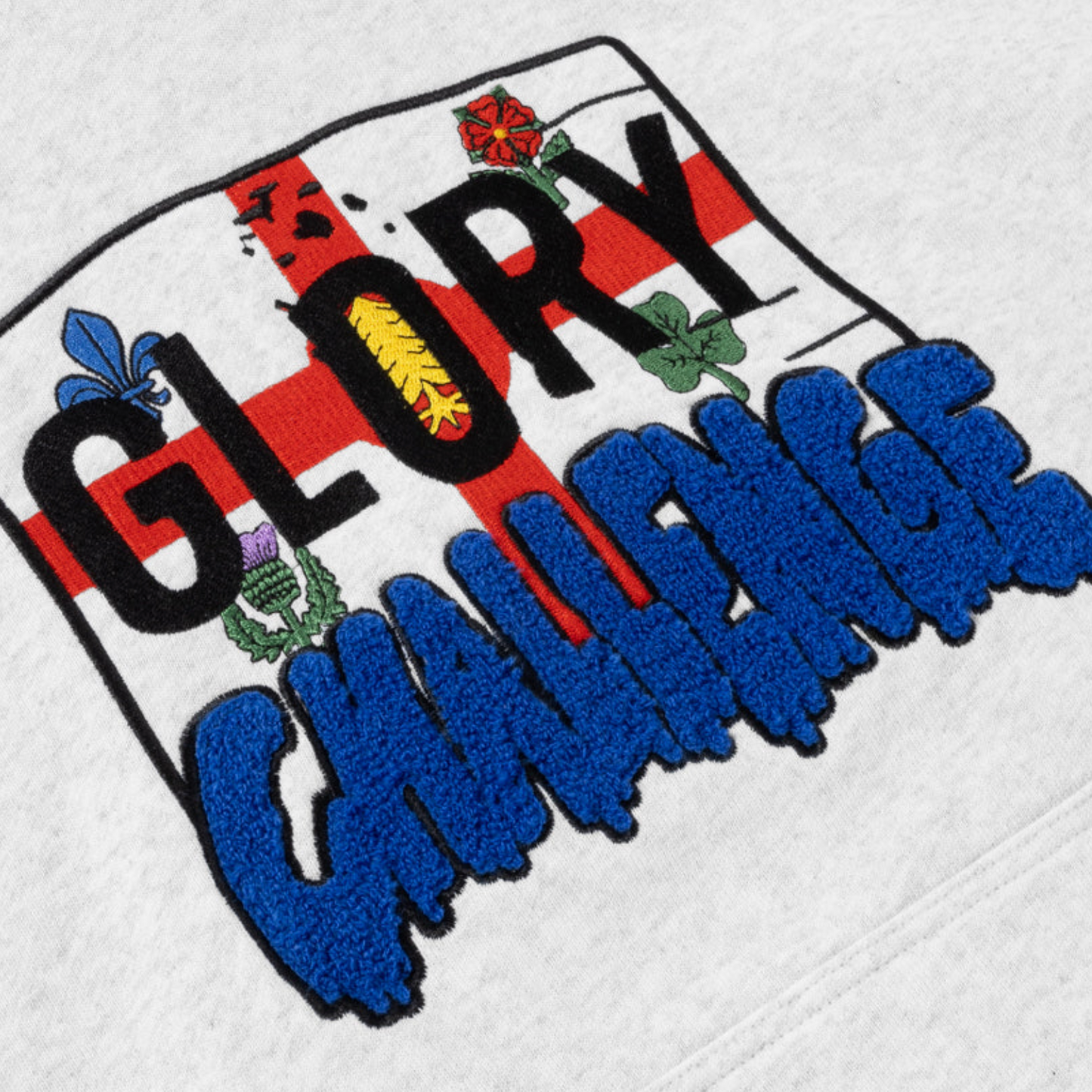 Embroidered patch with 'GLORY CHALLENGE' text on a white background