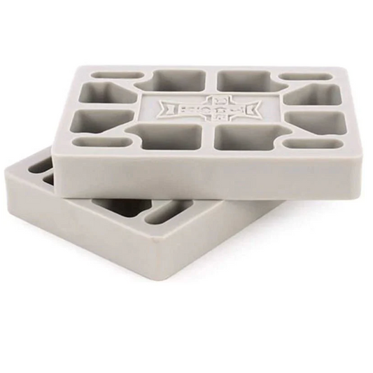 Gray silicone skateboard riser pad white background