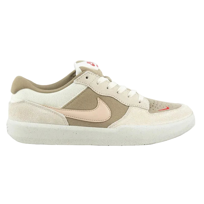 Beige and white sneaker with a logo on a light gray background