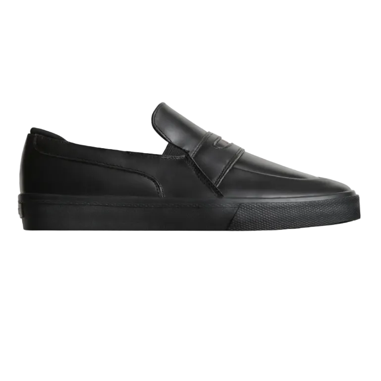 Black slip on shoe on white background