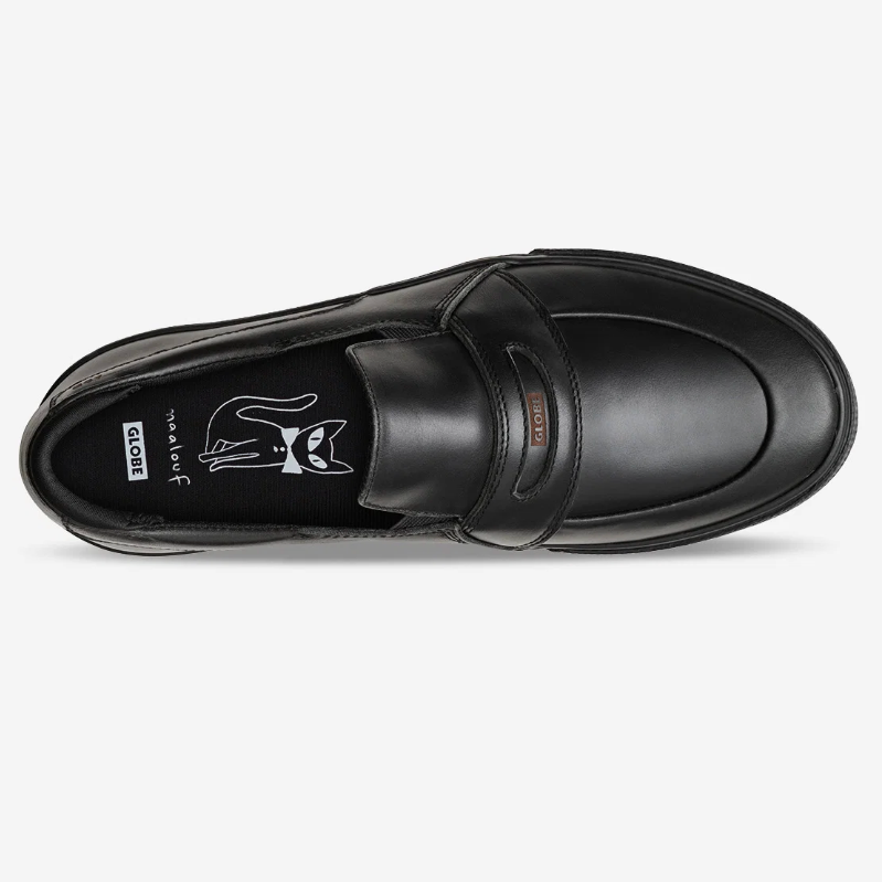 Top view of a black slip on shoe on white background