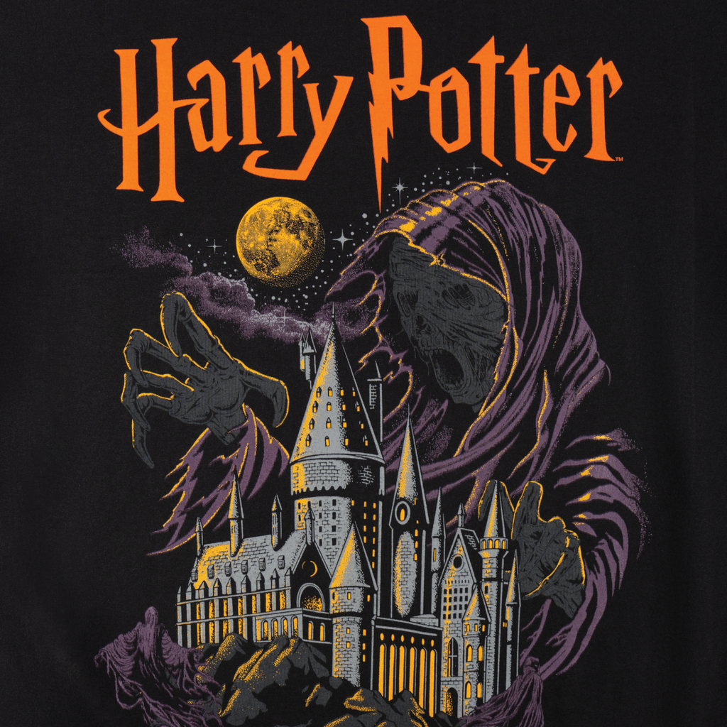 Harry Potter-themed shirt with a hooded figure, castle, and moon on a dark background