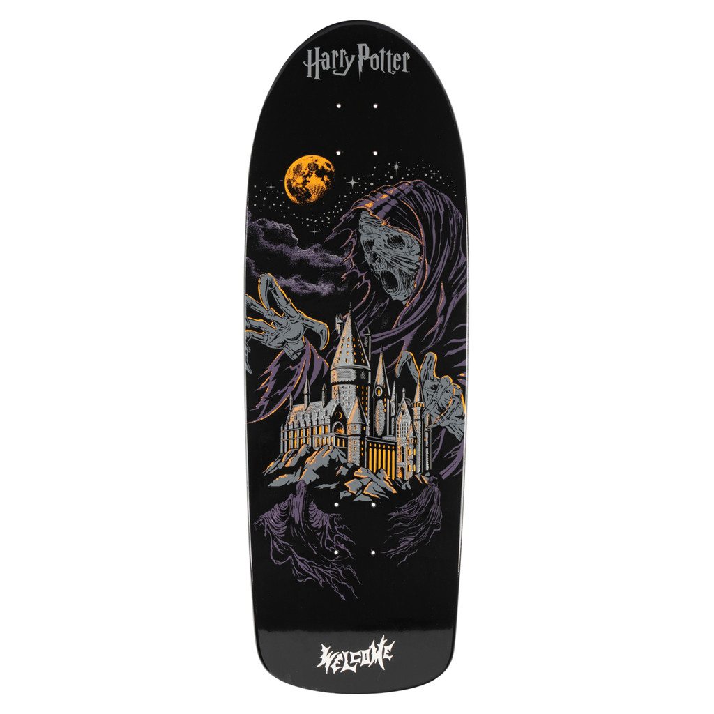 Skateboard deck with Harry Potter design featuring Hogwarts castle and moonlit sky.