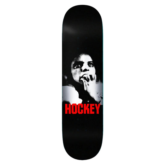 Skateboard deck with a black and white graphic and 'Hockey' branding on a light gray background