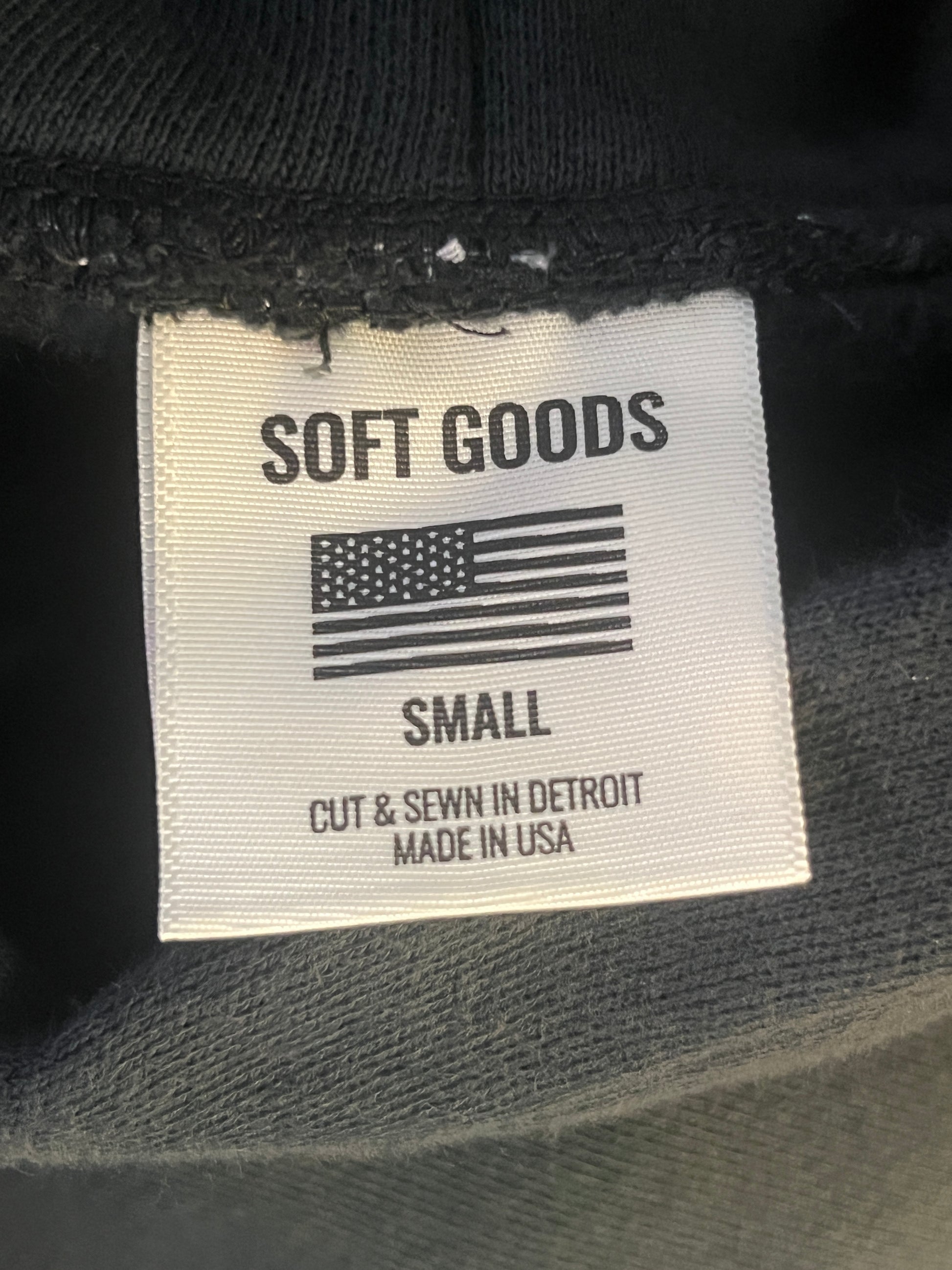 Soft Goods apparel tag with 'cut and sewn in detroit, made in usa' visable