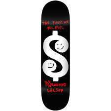 A skateboard deck shown with a black base with a large white dollar sign graphic and red text reading 'The Root of Evil' and 'Ripped by Wilson'.