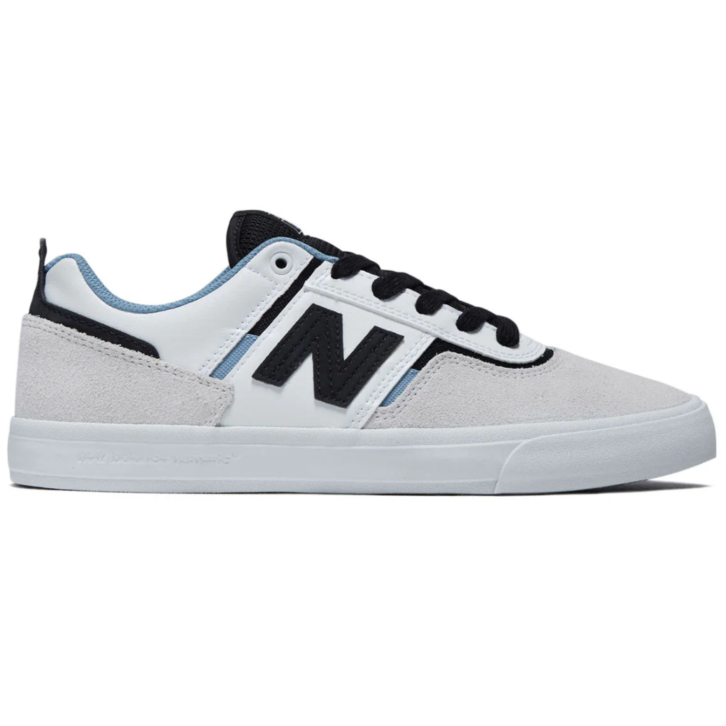 White sneaker with black accents on a white background