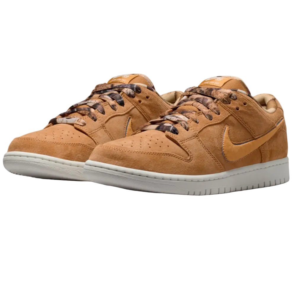 Pair of tan sneakers with a Nike logo on a white background