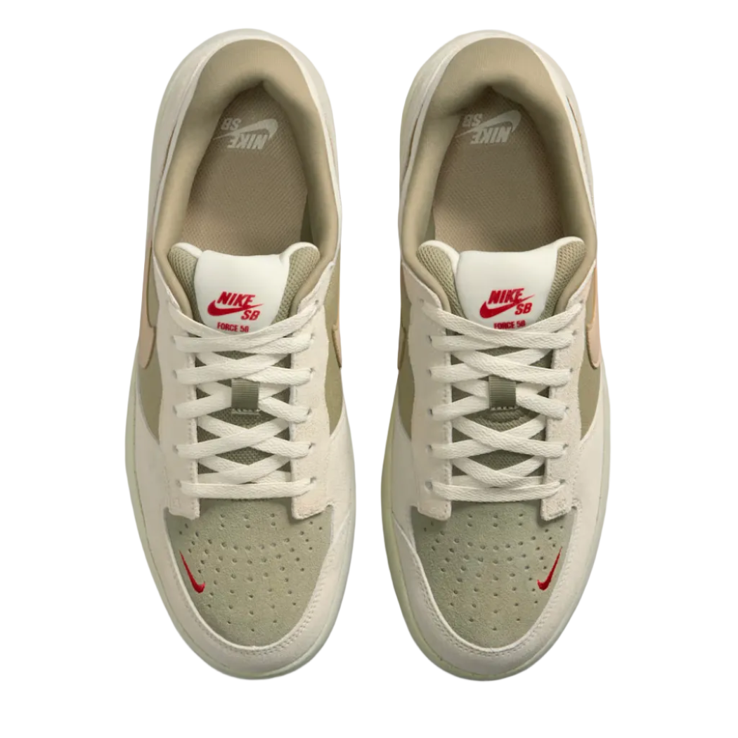 Pair of beige sneakers with red swoosh logo on a white background