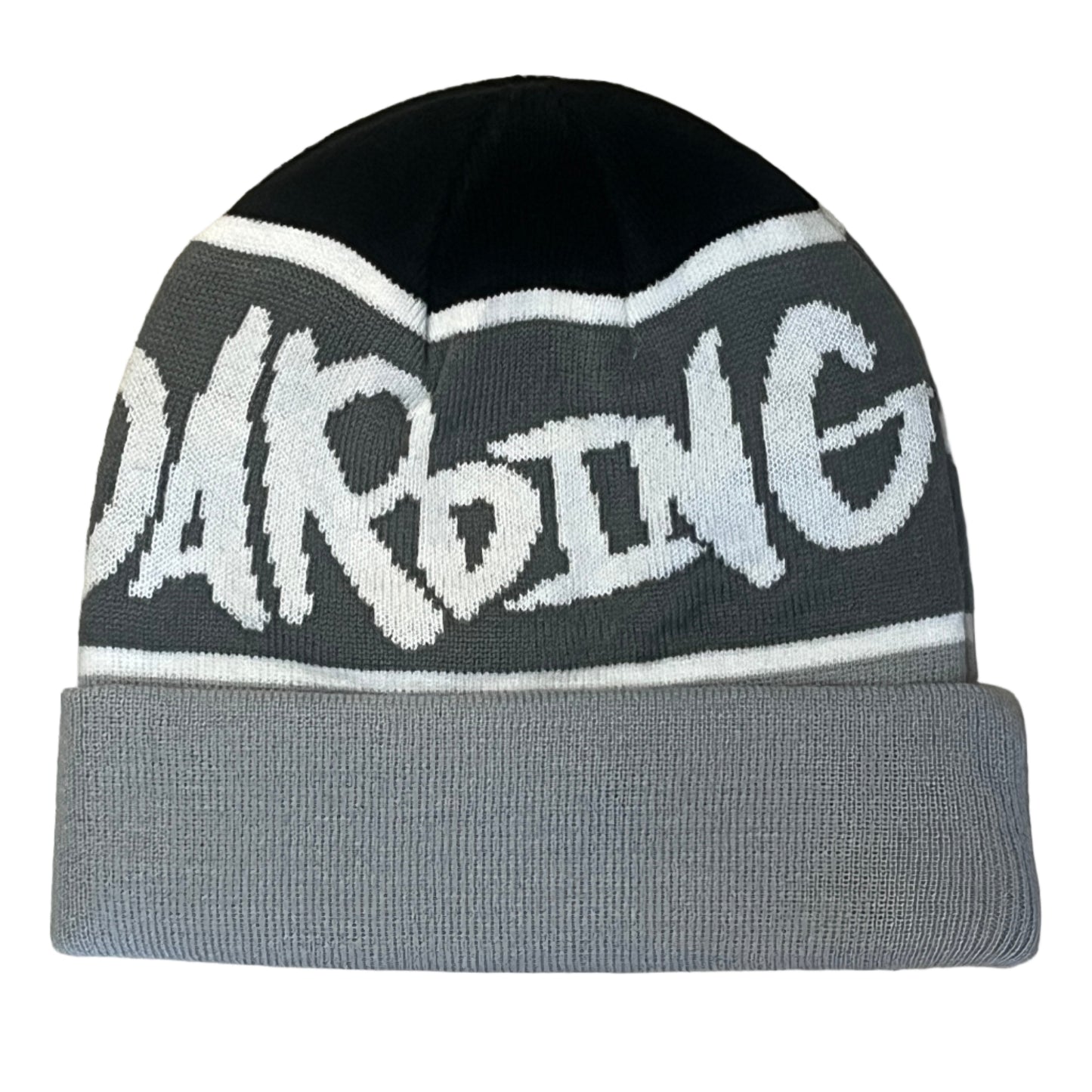 Gray beanie with white text on a wooden floor