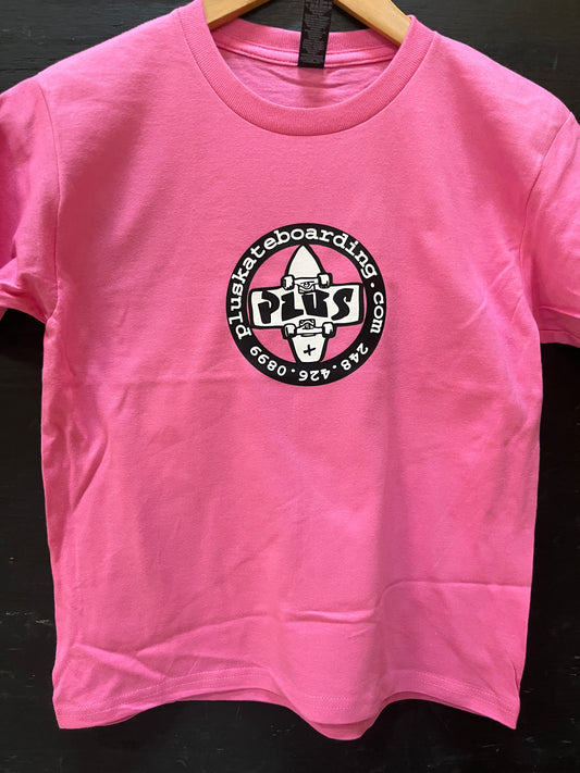 Pink t-shirt with a black logo on a dark background