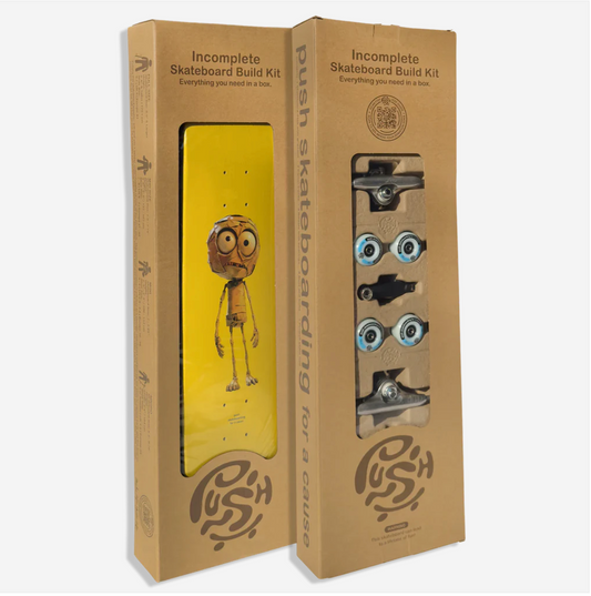 Two cardboard boxes for an incomplete skateboard build kit with a yellow skateboard deck and hardware on a white background.
