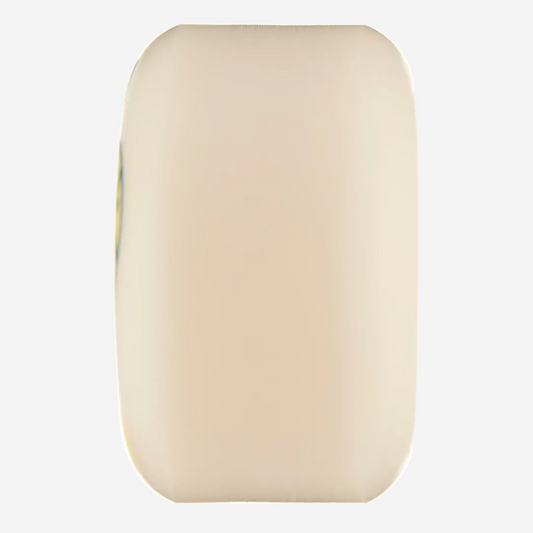 A single cream-colored, rounded rectangular cosmetic sponge or applicator pad shown against a plain white background.