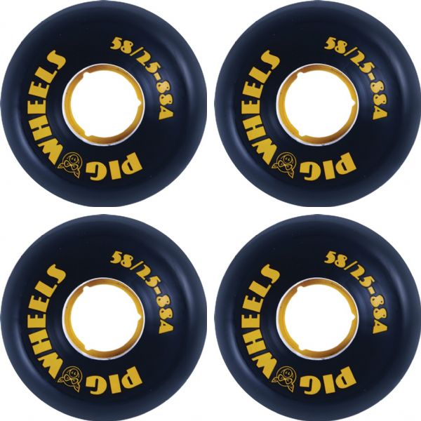 Four black pickleball wheels with yellow lettering and a yellow inner ring, arranged in a 2x2 grid on a white background. The brand name 'Pig Wheels' is clearly visible.